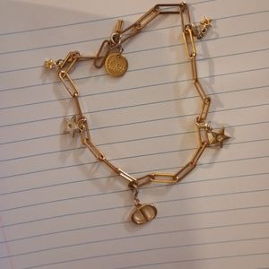 Real nice Christian Dior vintage gold metal oval chain link bracelet with charms